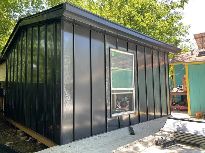 Black standing seam metal wall panels for Roof Inspection in Muncie